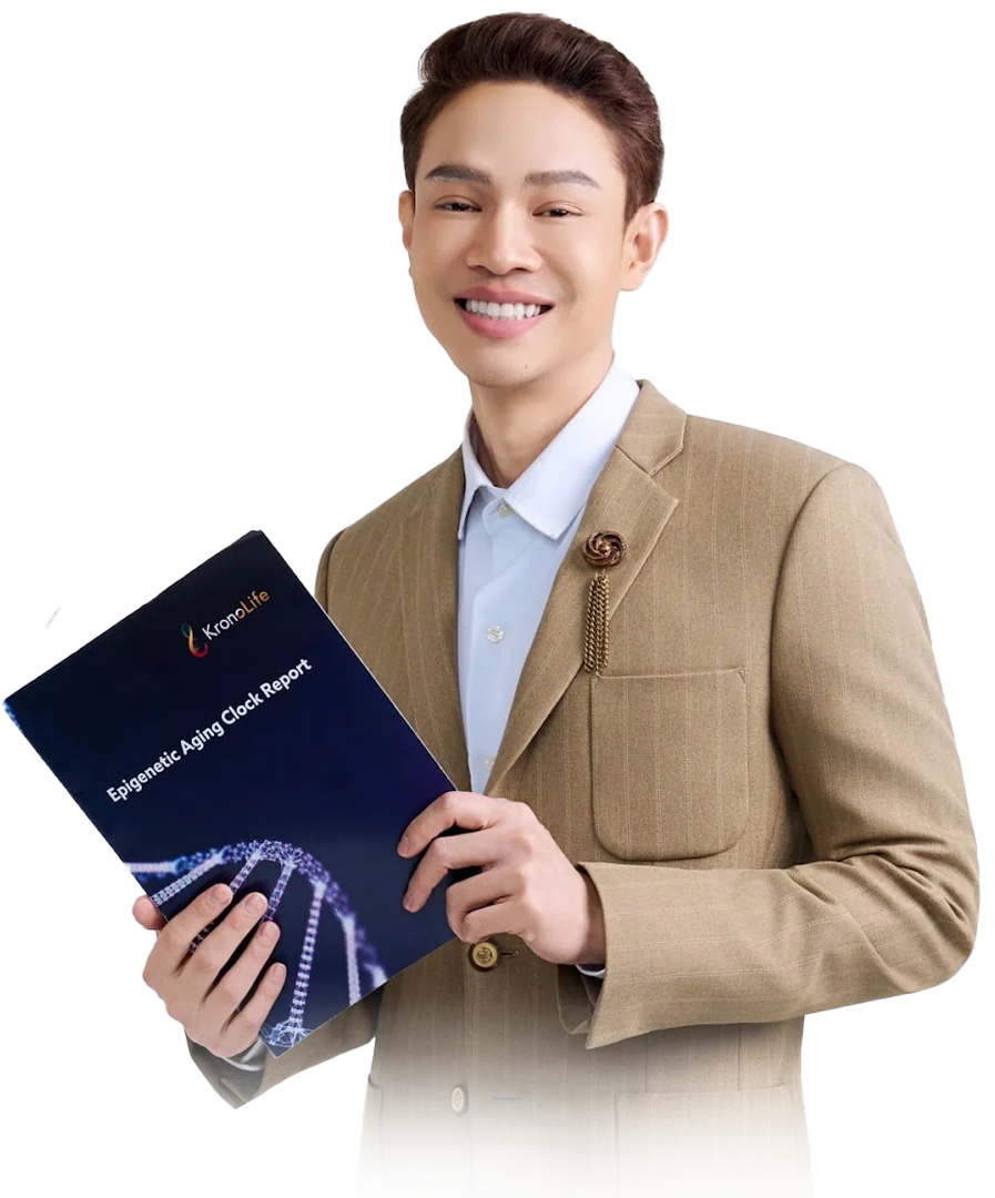 Dr. Tawin Iempridee holding a KronoLife Epigenetic Aging Clock Report